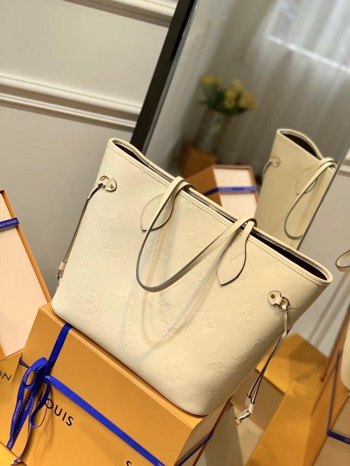 LOUIS VUITTON NEVERFULL MM 32 CREAM EMBOSSED COWHIDE LEATHER