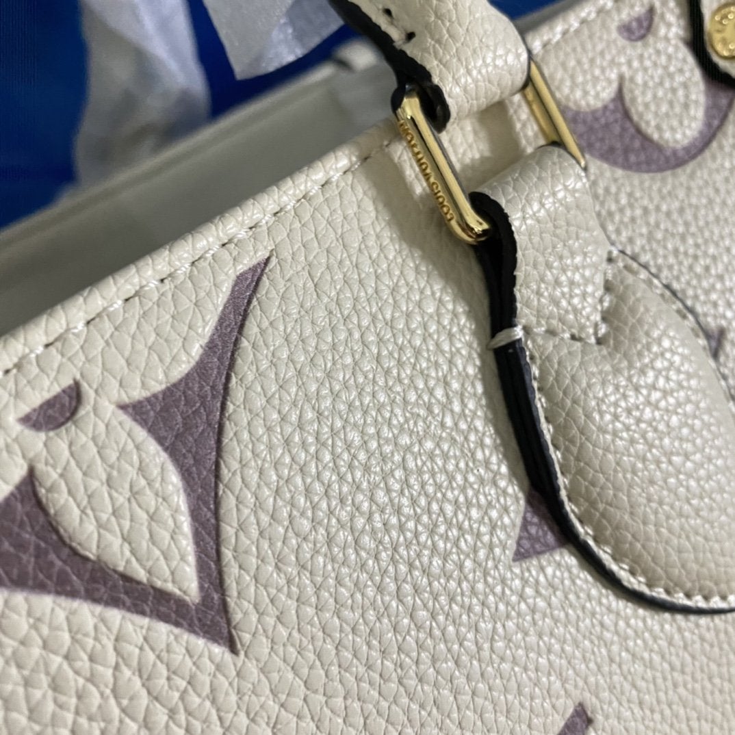 LOUIS VUITTON ONTHEGO PM 25 CREAM EMBOSSED GRAINED COWHIDE LEATHER