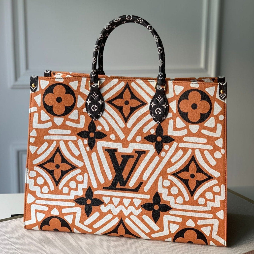 LOUIS VUITTON CRAFTY ONTHEGO GM 41 CARAMEL AND CREAM MONOGRAM GIANT CANVAS
