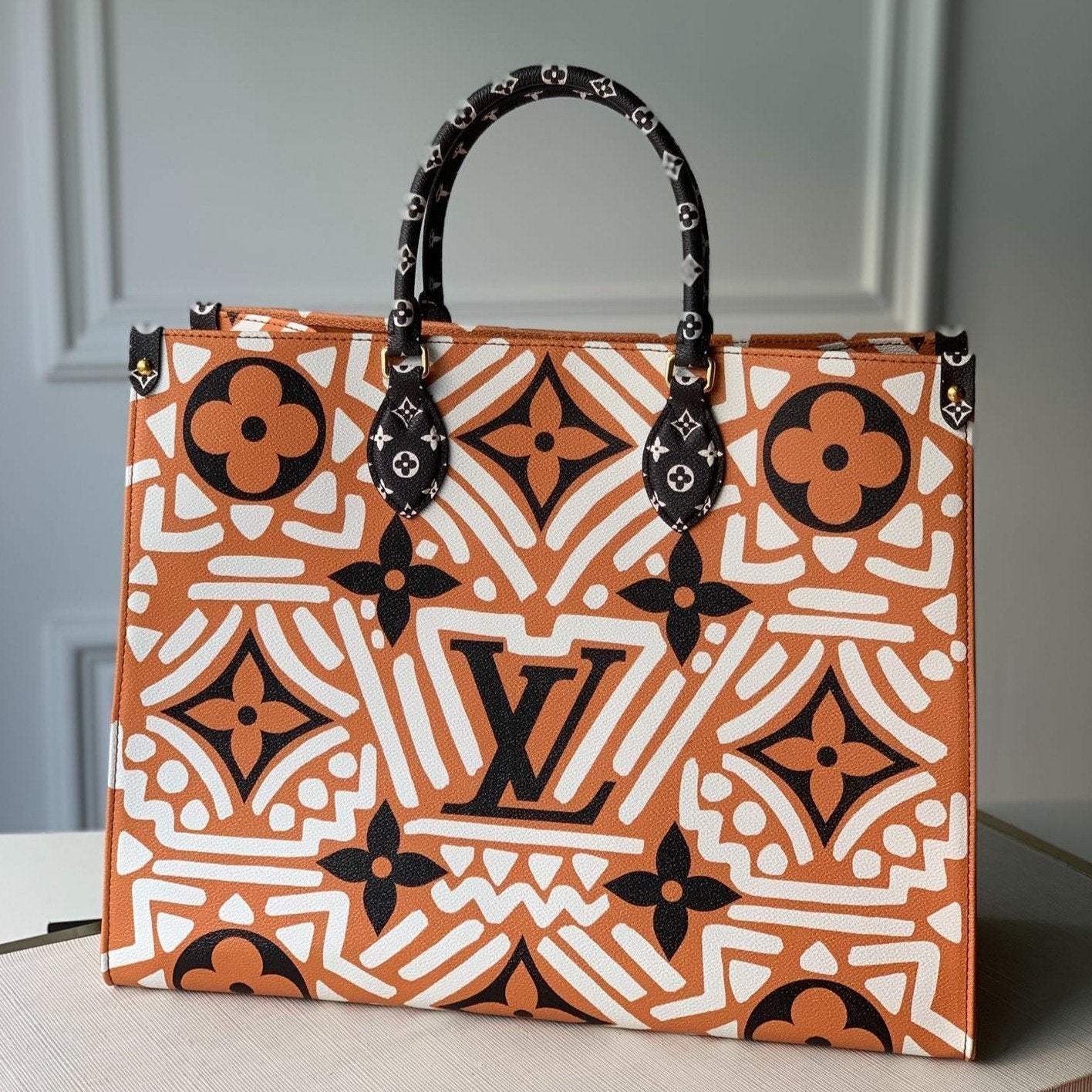 LOUIS VUITTON CRAFTY ONTHEGO GM 41 CARAMEL AND CREAM MONOGRAM GIANT CANVAS