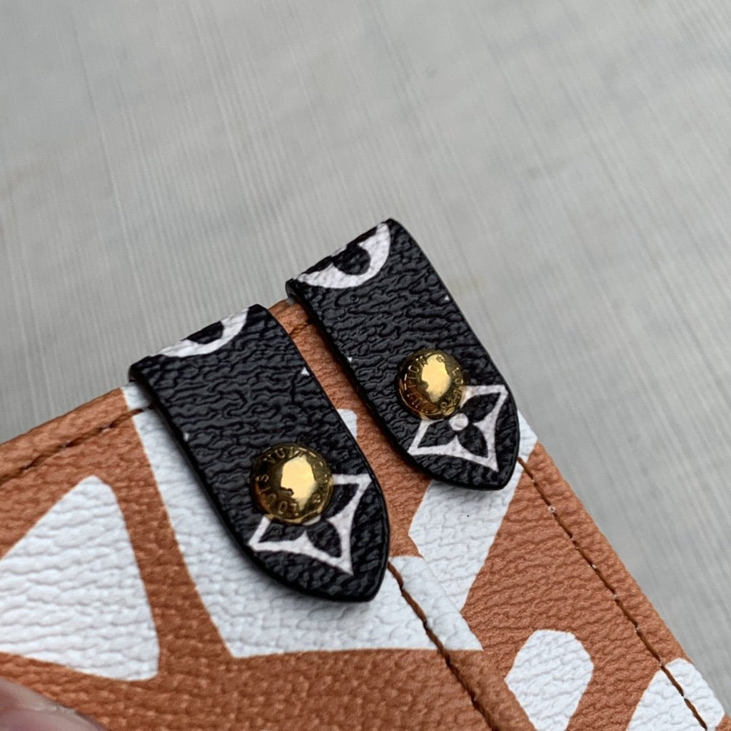 LOUIS VUITTON CRAFTY ONTHEGO GM 41 CARAMEL AND CREAM MONOGRAM GIANT CANVAS