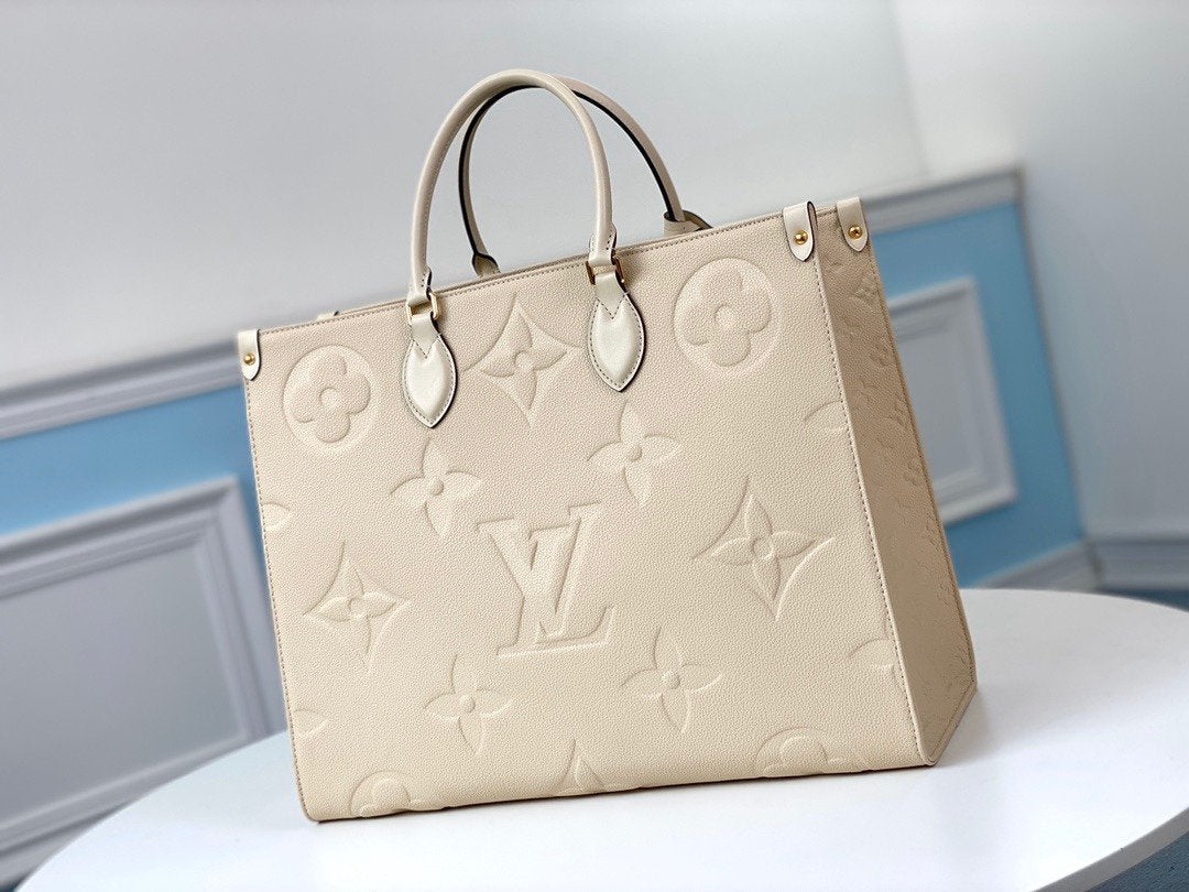 LOUIS VUITTON ONTHEGO GM 41 CREAM MONOGRAM EMPREINTE GIANT CANVAS