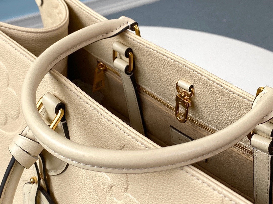 LOUIS VUITTON ONTHEGO GM 41 CREAM MONOGRAM EMPREINTE GIANT CANVAS