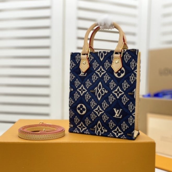 LOUIS VUITTON PETIT SAC PLAT BLUE MONOGRAM SINCE 1854 TEXTILE