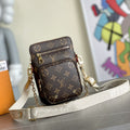 LOUIS VUITTON UTILITY PHONE SLEEVE 16CM MONOGRAM