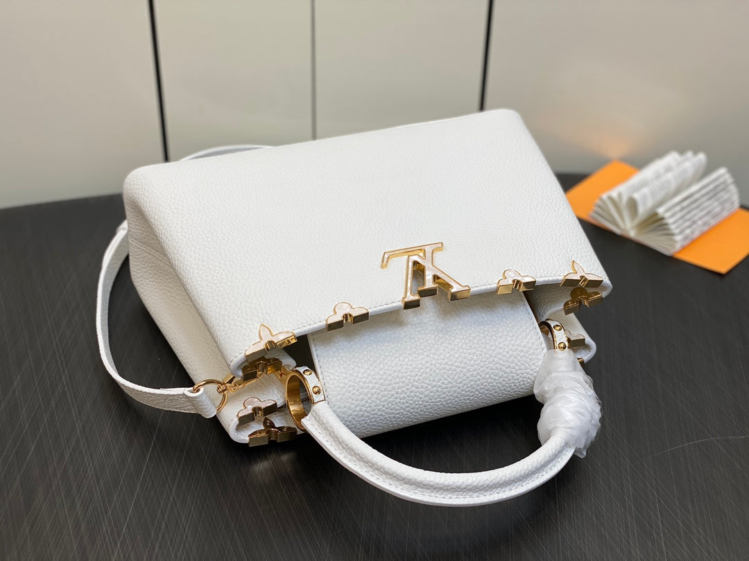 LOUIS VUITTON CAPUCINES MM 31 WHITE TAURILLON GOLD HARDWARE