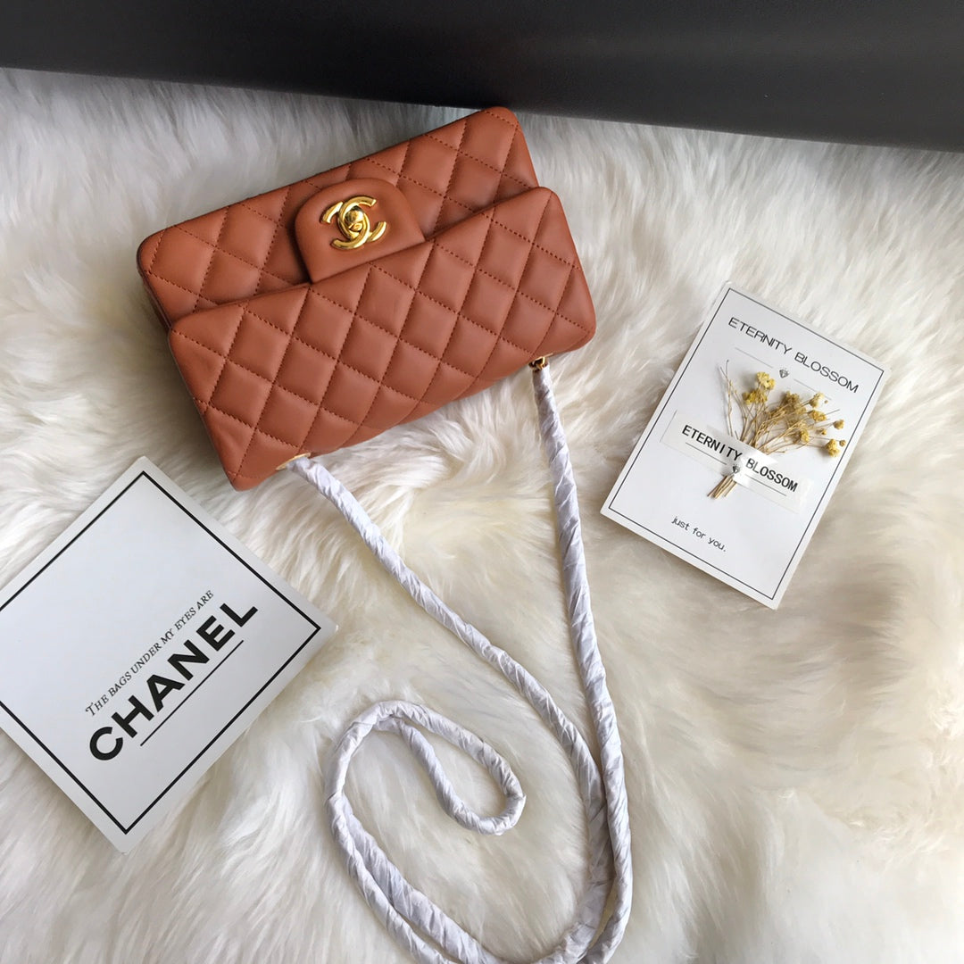 CHANEL 20 CLASSIC SMALL DOUBLE FLAP BAG IN CARAMEL BROWN CALFSKIN