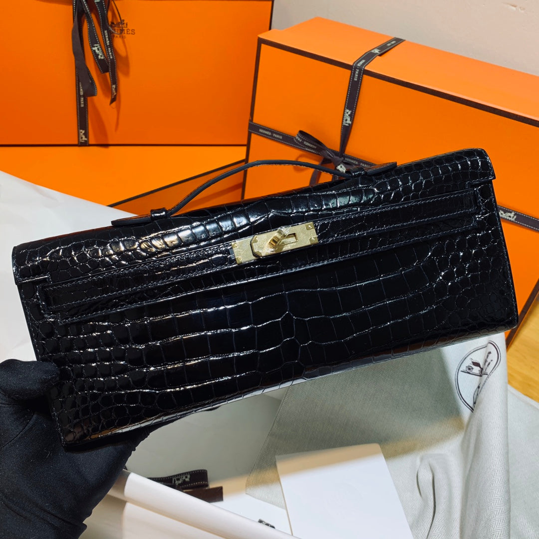 HERMES KELLY CUT 31 IN BLACK SHINY ALLIGATOR LEATHER WITH GOLD HARDWARE
