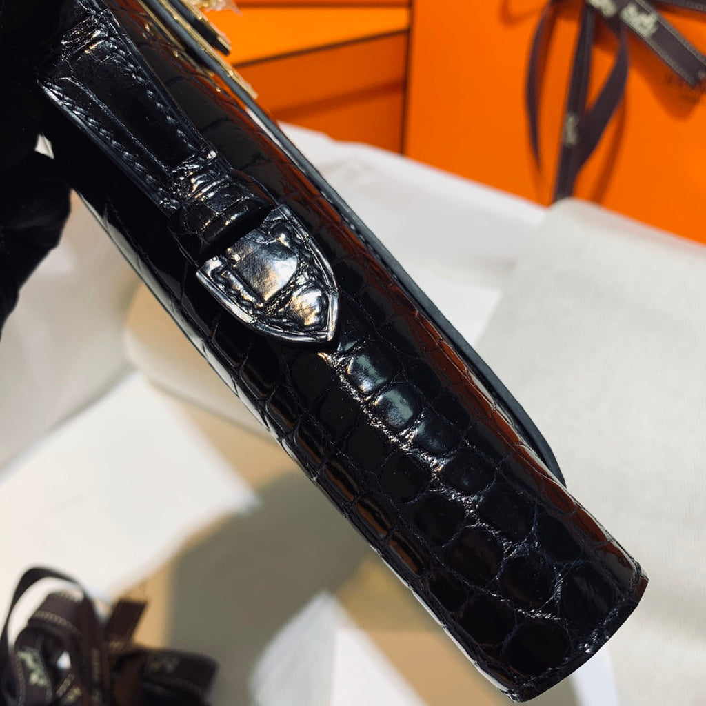 HERMES KELLY CUT 31 IN BLACK SHINY ALLIGATOR LEATHER WITH GOLD HARDWARE