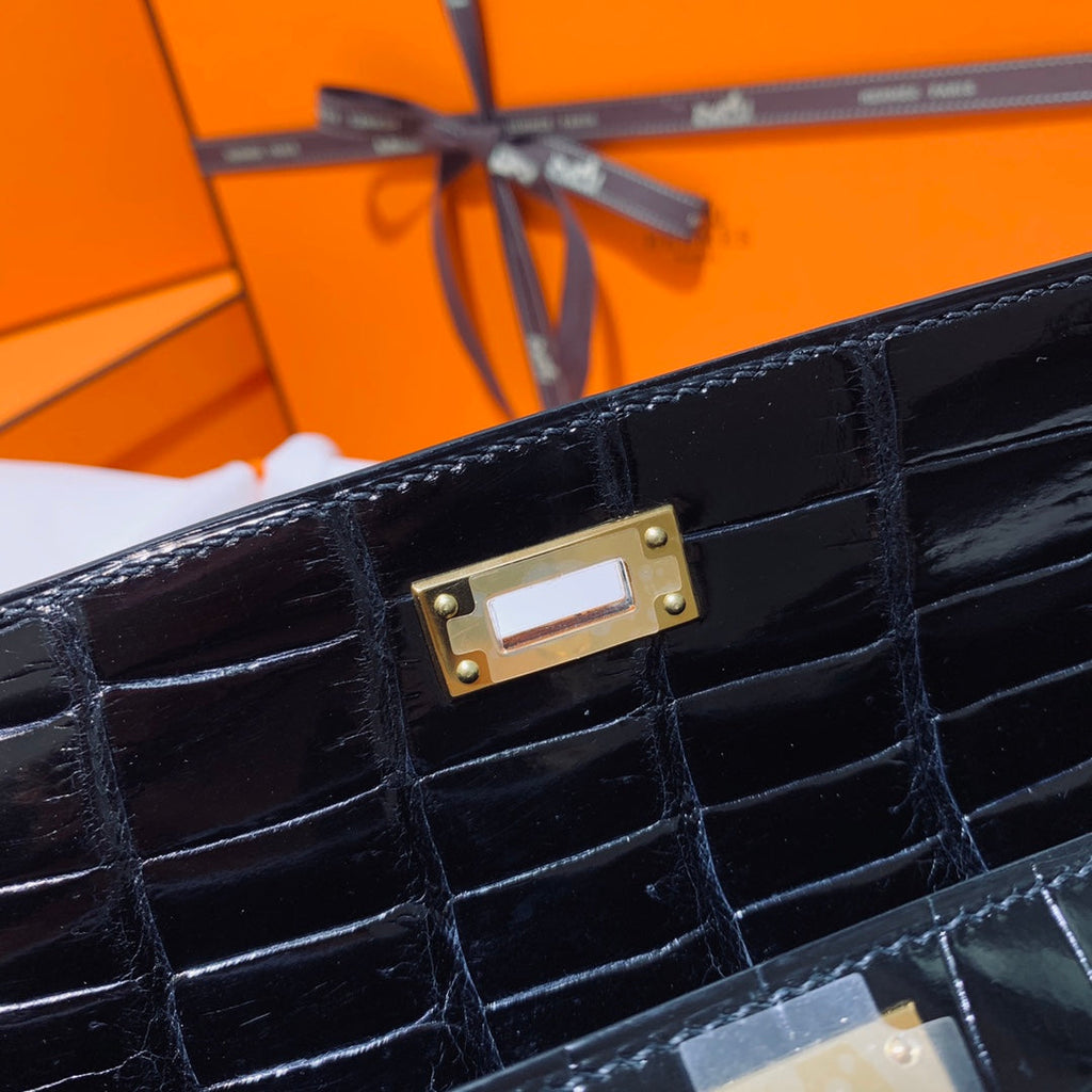 HERMES KELLY CUT 31 IN BLACK SHINY ALLIGATOR LEATHER WITH GOLD HARDWARE