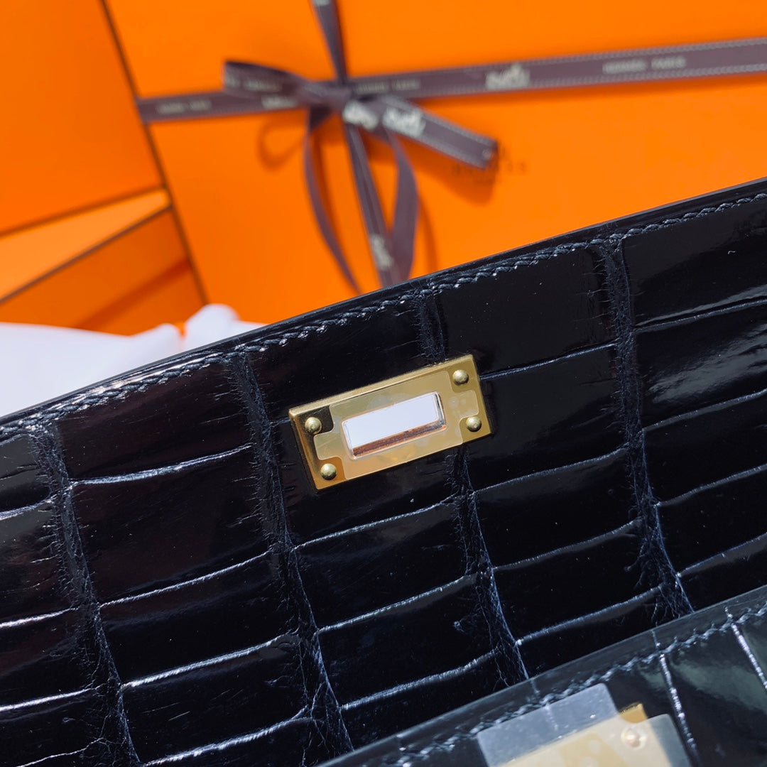 HERMES KELLY CUT 31 IN BLACK SHINY ALLIGATOR LEATHER WITH GOLD HARDWARE