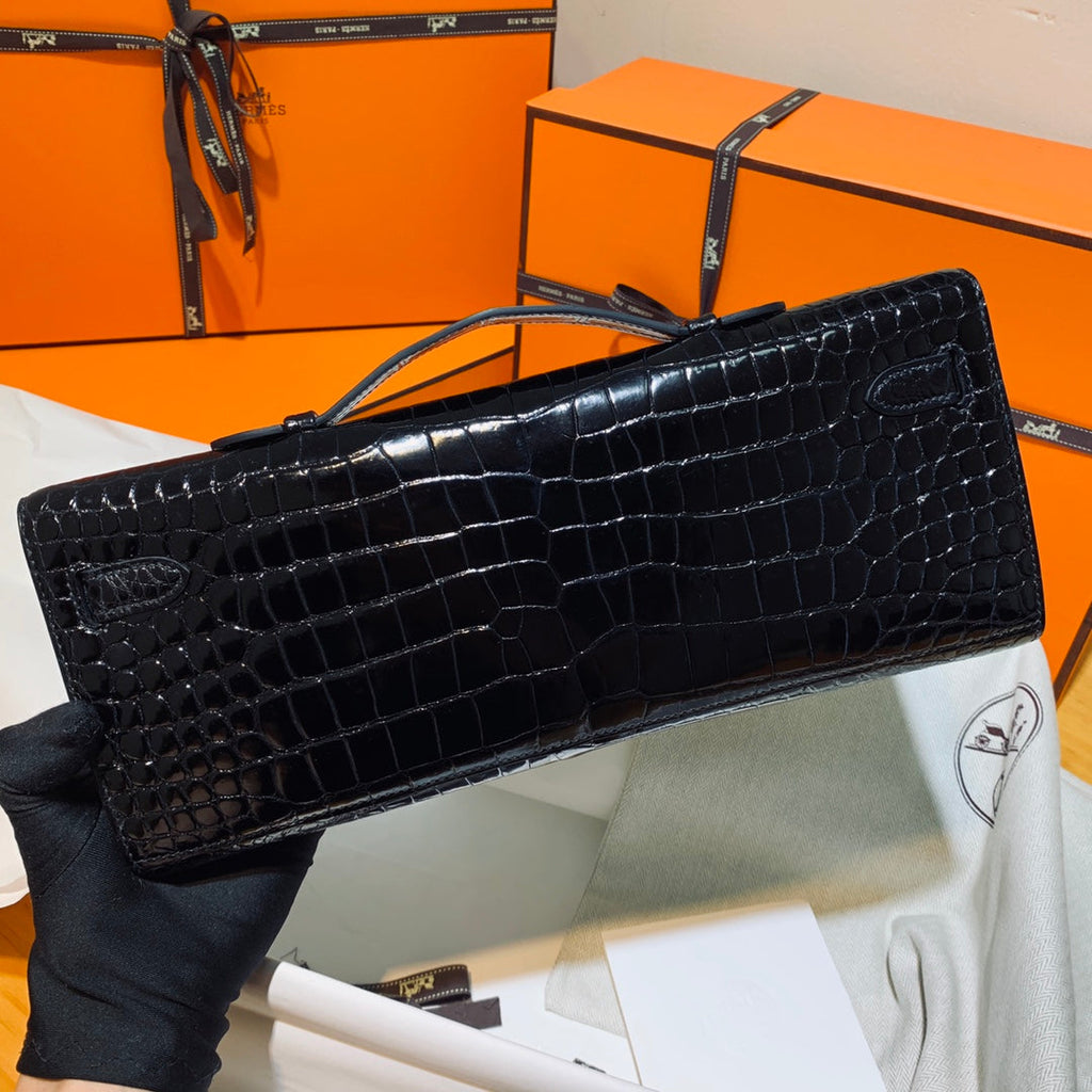 HERMES KELLY CUT 31 IN BLACK SHINY ALLIGATOR LEATHER WITH GOLD HARDWARE