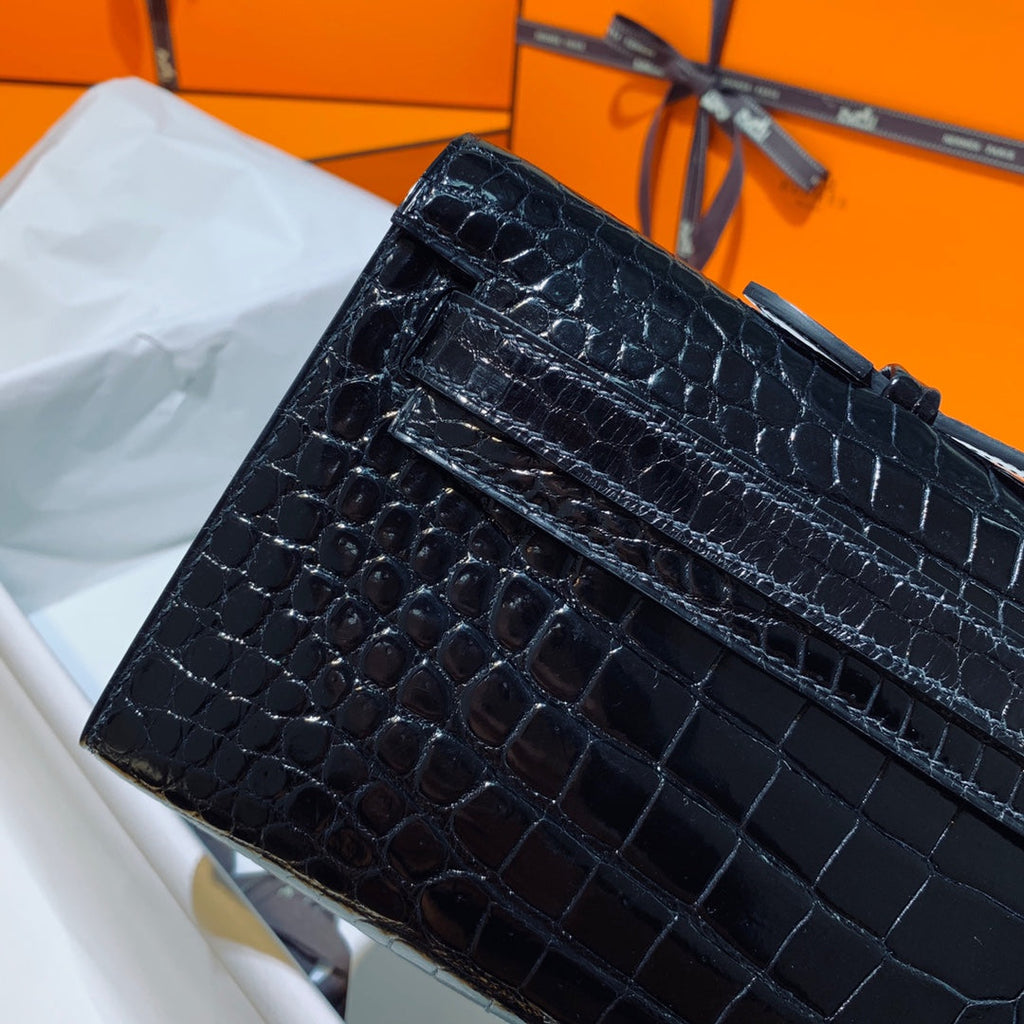HERMES KELLY CUT 31 IN BLACK SHINY ALLIGATOR LEATHER WITH GOLD HARDWARE