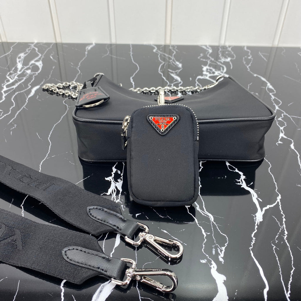 PRADA HOBO 22 BAG IN BLACK RE-NYLON WITH RED LOGO