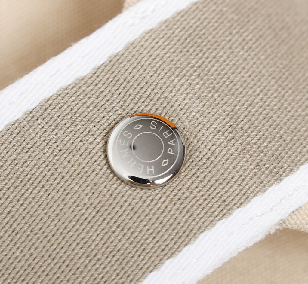 HERMES BRIDE-A-BRAC 25 BEIGE CANVAS