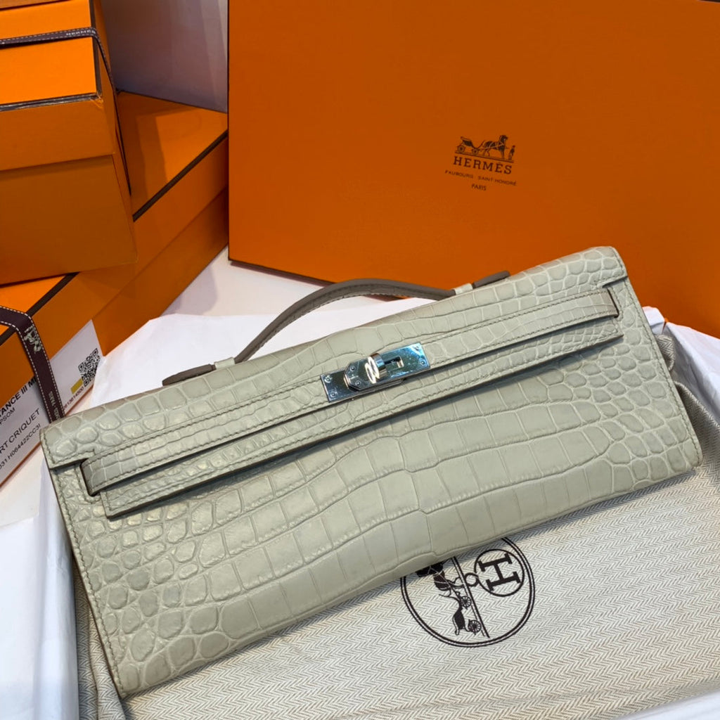 HERMES KELLY CUT 31 IN PEARL GRAY ALLIGATOR LEATHER WITH SILVER HARDWARE