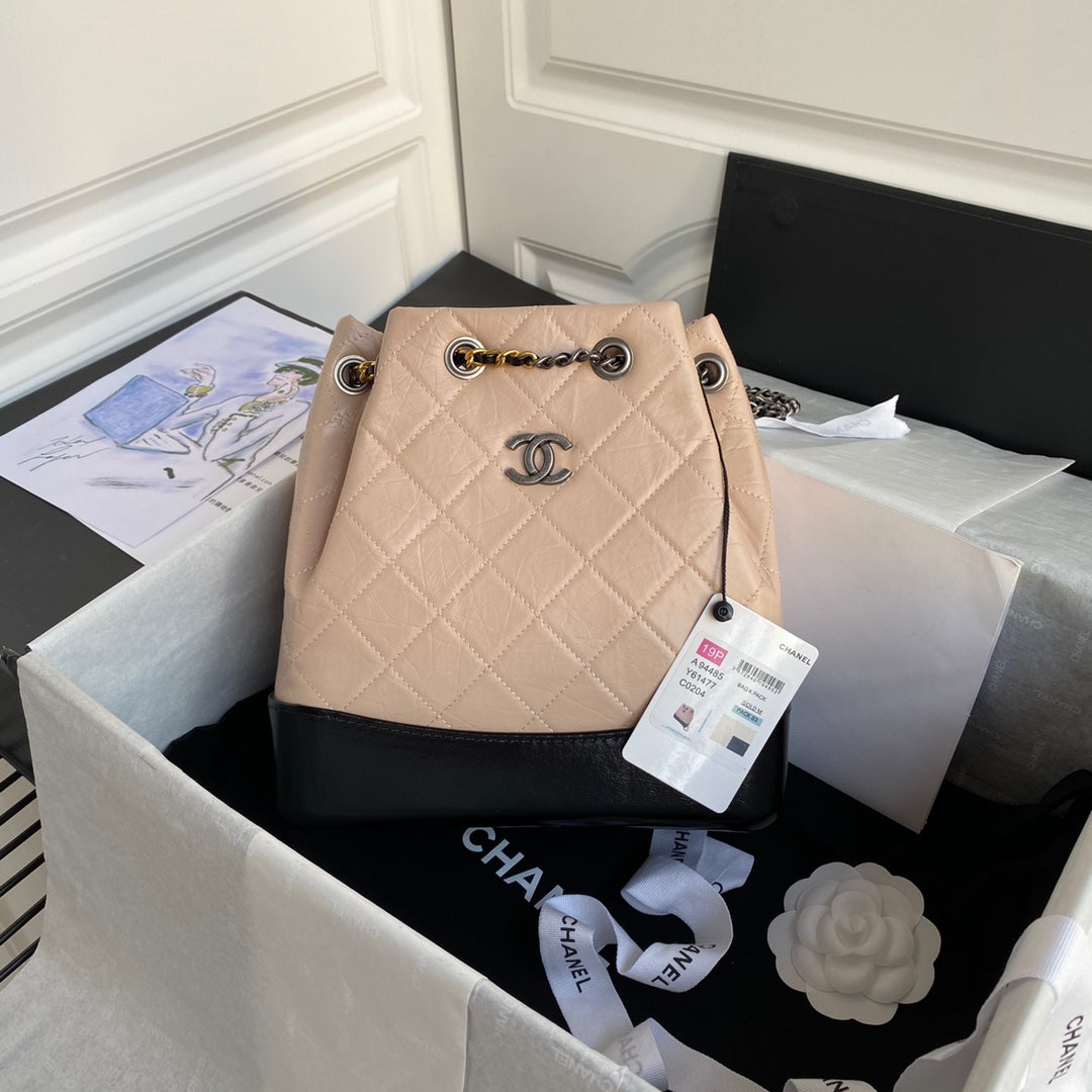 CHANEL GRABRIELLE SMALL 24 BACKPACK IN ALMOND BEIGE MIX BLACK CALFSKIN