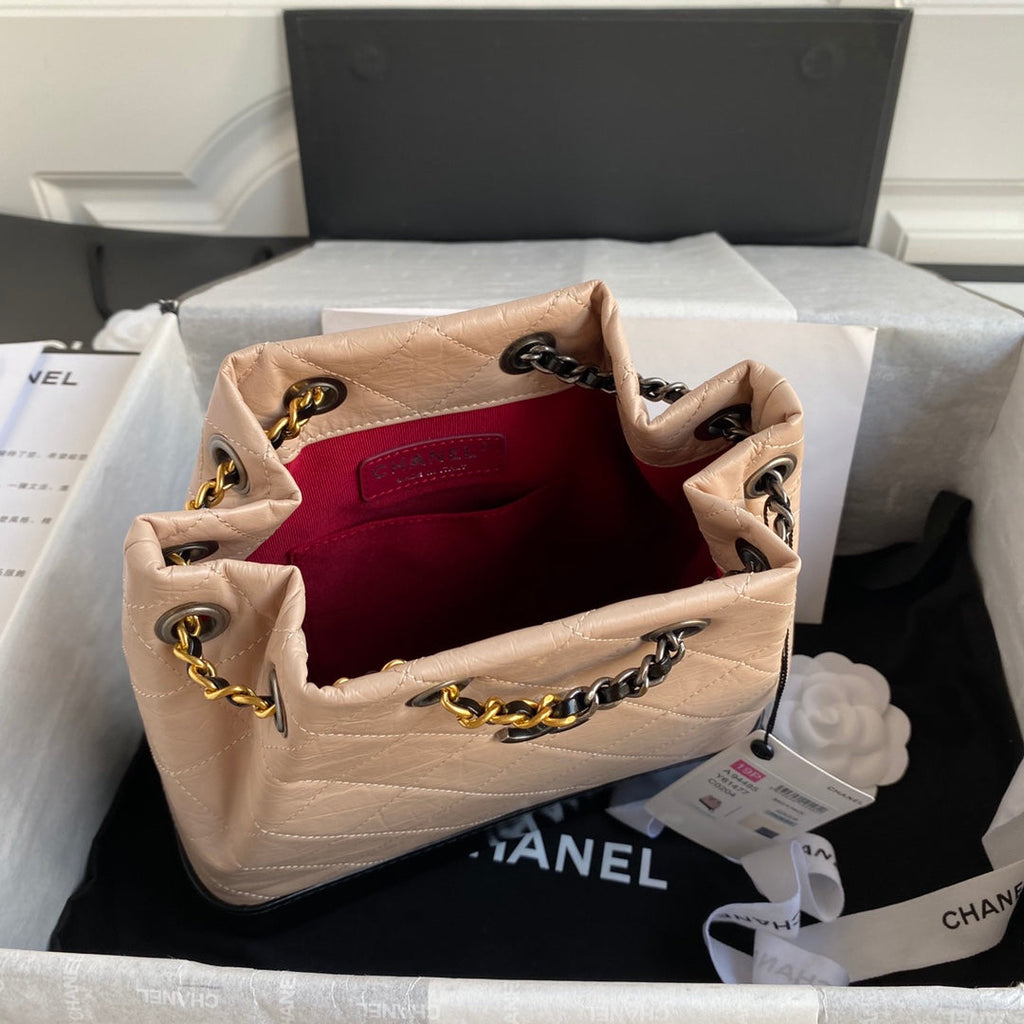 CHANEL GRABRIELLE SMALL 24 BACKPACK IN ALMOND BEIGE MIX BLACK CALFSKIN