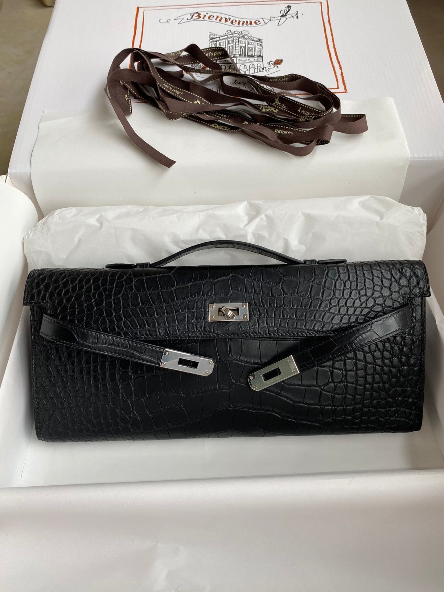 HERMES KELLY CUT 31 IN BLACK ALLIGATOR LEATHER WITH SILVER HARDWARE
