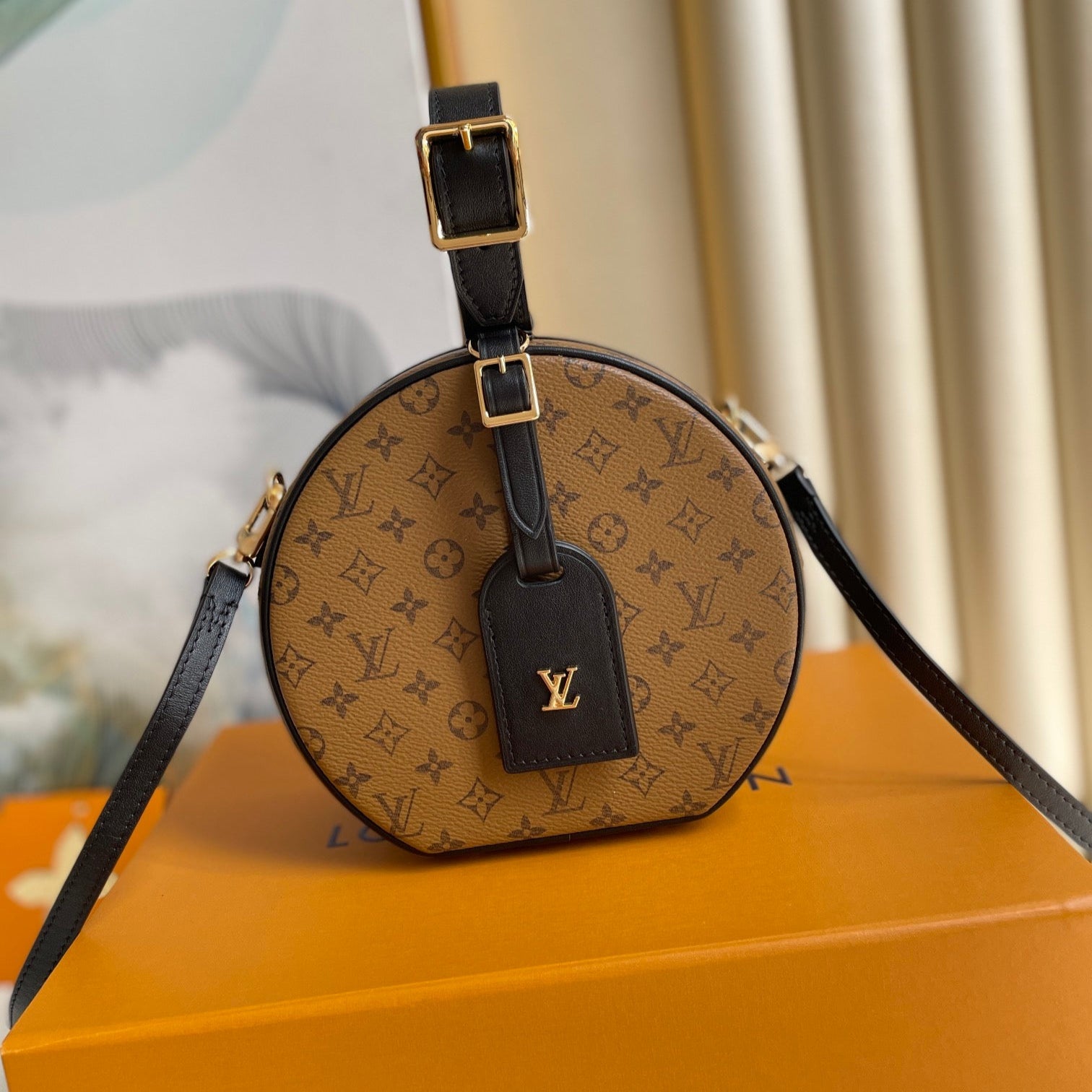 LOUIS VUITTON LV 25S PETITE BOITE CHAPEAU 17 IN BLACK MONOGRAM REVERSE CALFSKIN