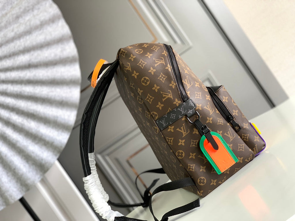 LOUIS VUITTON DISCOVERY BACKPACK 40 IN BROWN MONOGRAM CANVAS RUBBER LOGO