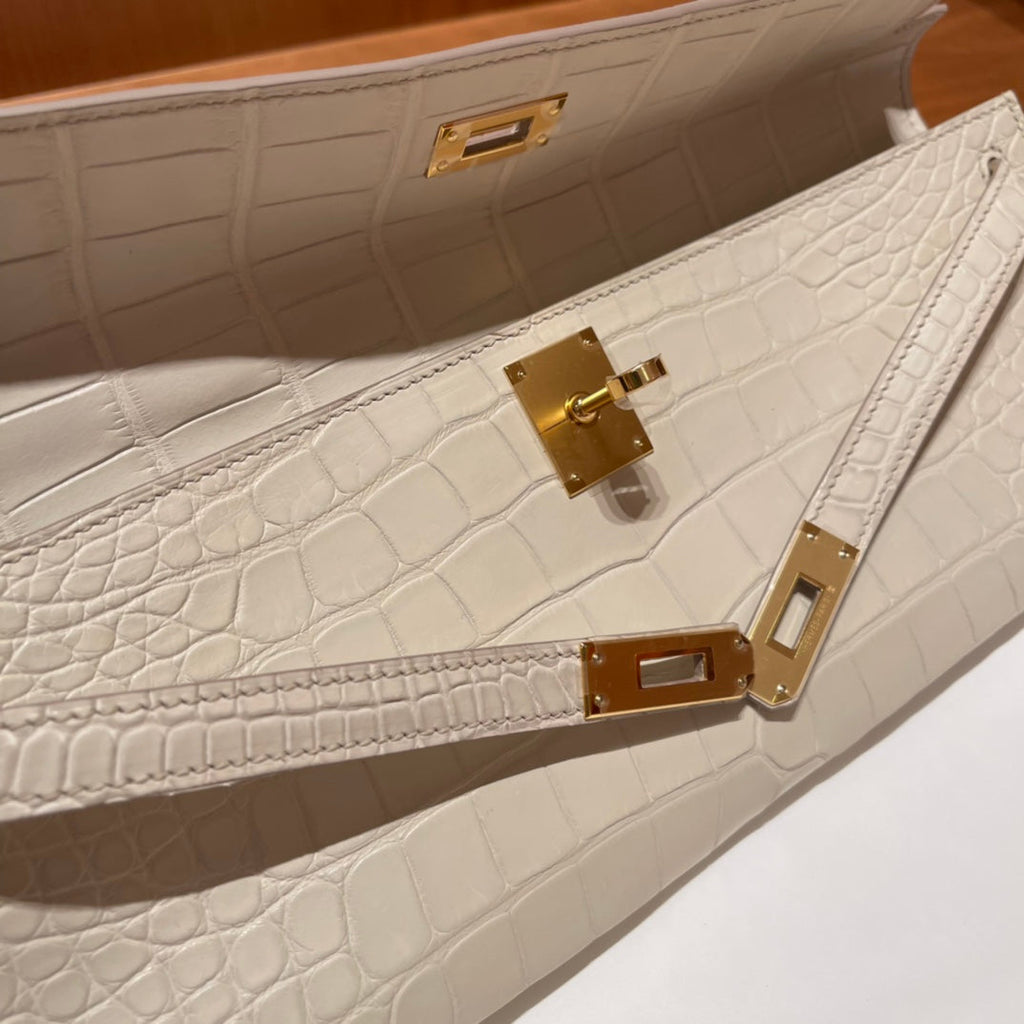 HERMES KELLY CUT 31 IN WHITE CREAM ALLIGATOR LEATHER WITH GOLD HARDWARE