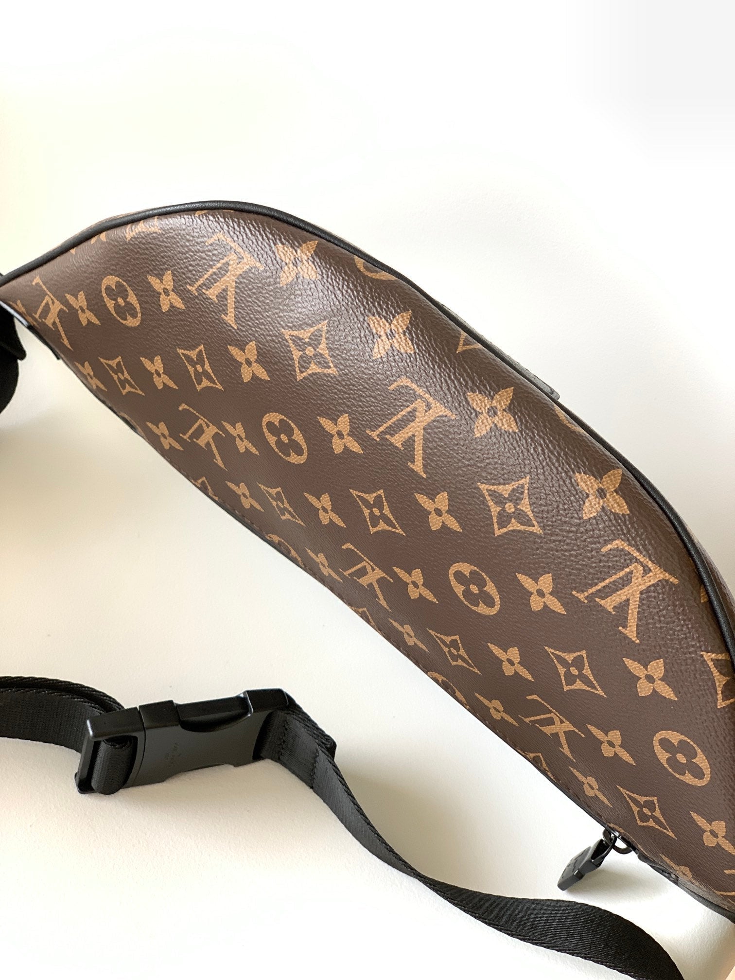 LOUIS VUITTON LV 25S DISCOVERY BUMBAG 47 IN BROWN AND BLACK EMBOSSED MONOGRAM ECLIPSE CALFSKIN