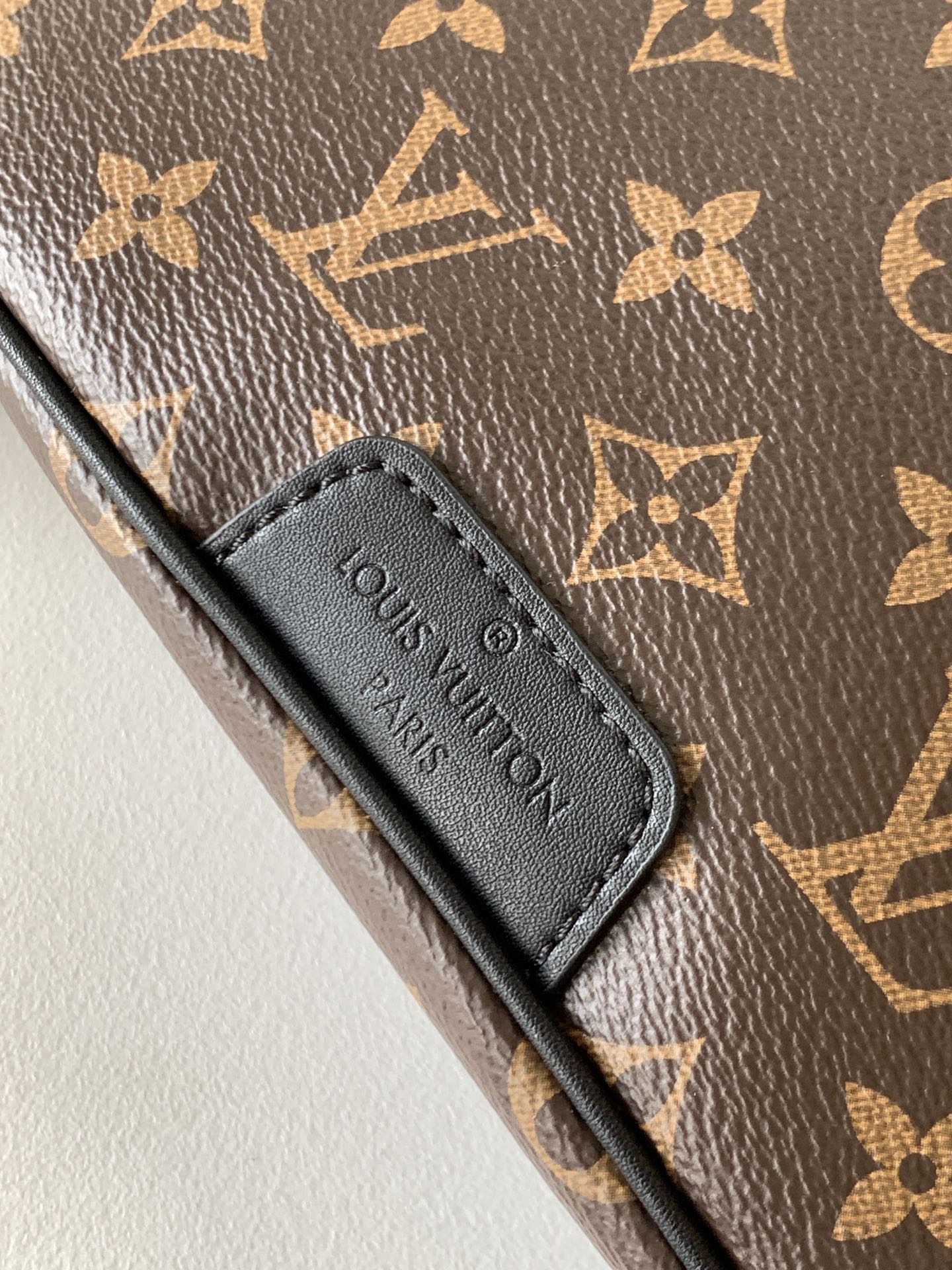 LOUIS VUITTON LV 25S DISCOVERY BUMBAG 47 IN BROWN AND BLACK EMBOSSED MONOGRAM ECLIPSE CALFSKIN
