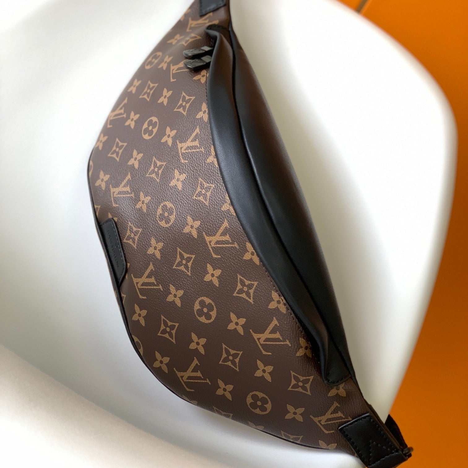 LOUIS VUITTON LV 25S DISCOVERY BUMBAG 47 IN BROWN AND BLACK EMBOSSED MONOGRAM ECLIPSE CALFSKIN