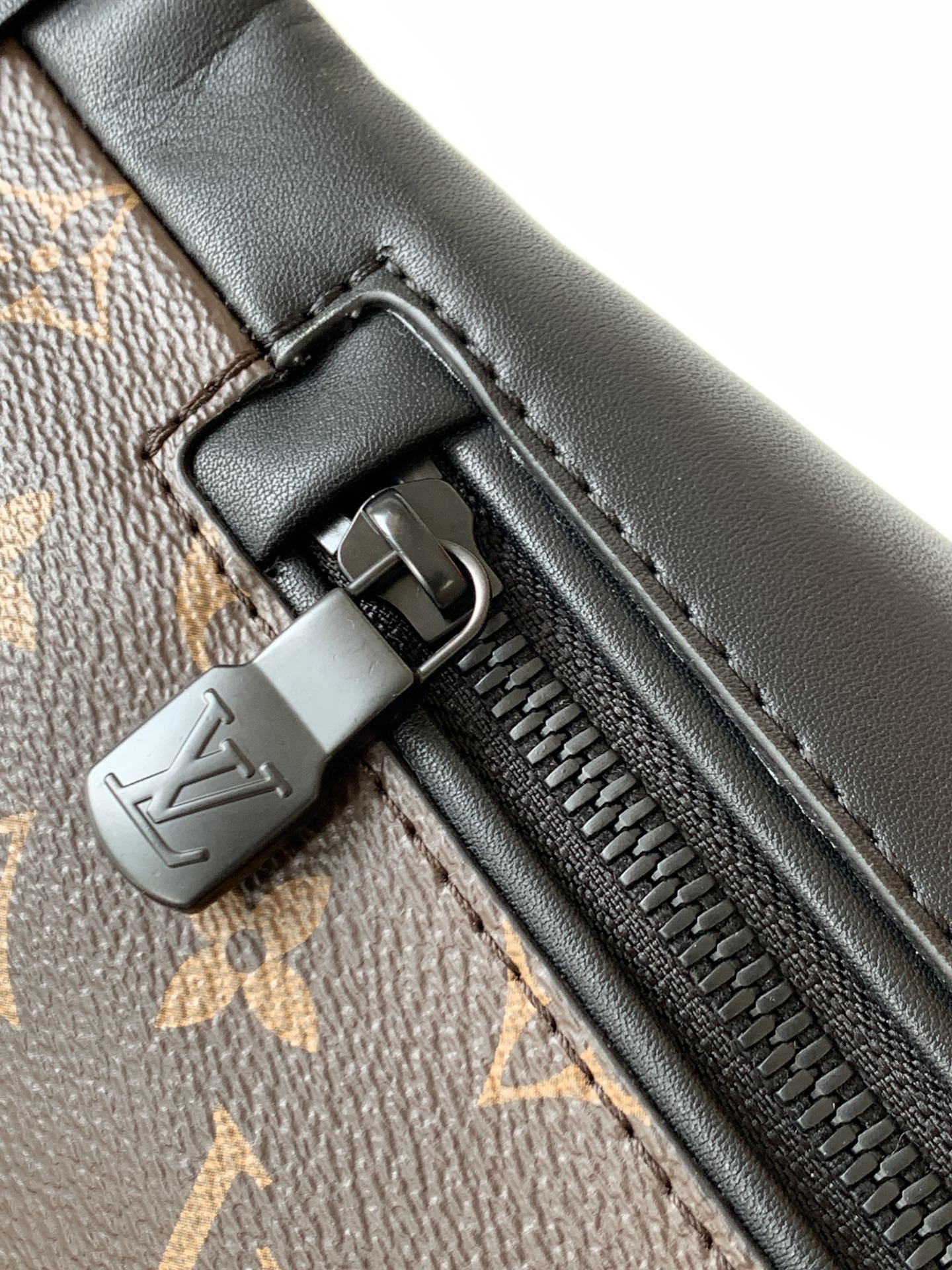 LOUIS VUITTON LV 25S DISCOVERY BUMBAG 47 IN BROWN AND BLACK EMBOSSED MONOGRAM ECLIPSE CALFSKIN