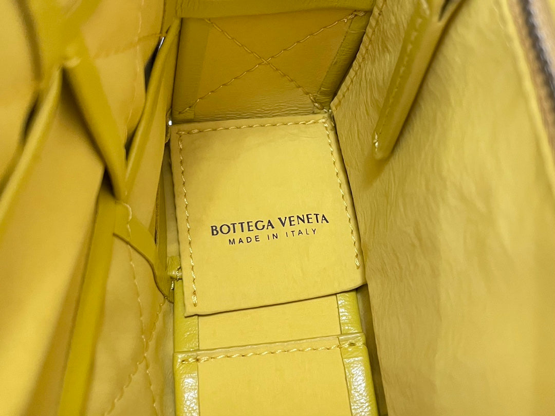 BOTTEGA VENETA SMALL CASSETTE 23 IN CANARY YELLOW CALFSKIN