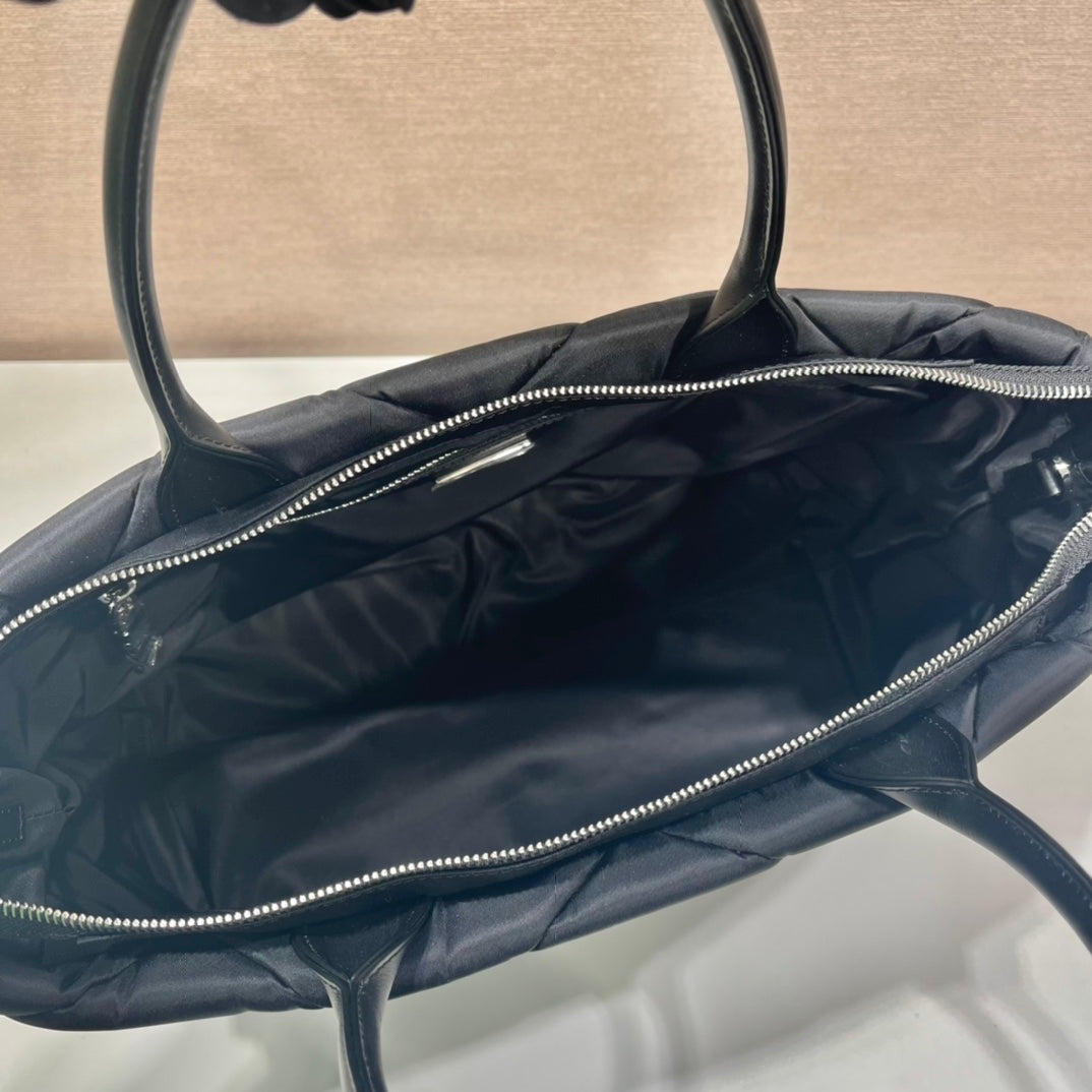 PRADA TRIANGLE PATTERN TOTE BAG 33 IN BLACK QUILTED RE-NYLON
