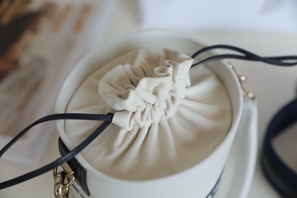 DIOR VIBE 18 BUCKET BAG IN WHITE CALFSKIN