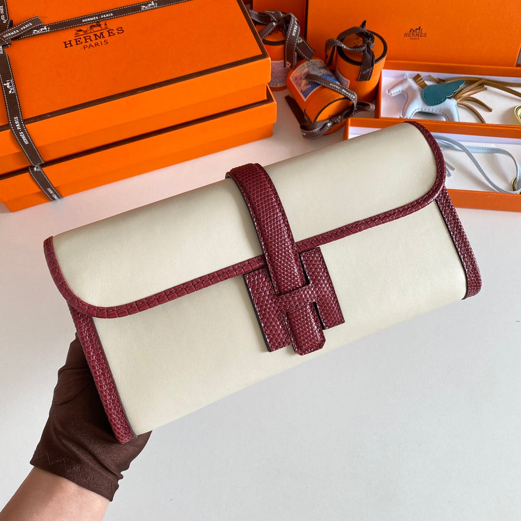 HERMES JIGE ELAN 29 CLUTCH IN WHITE CALFSKIN WITH GARNET RED LIZARD SKIN