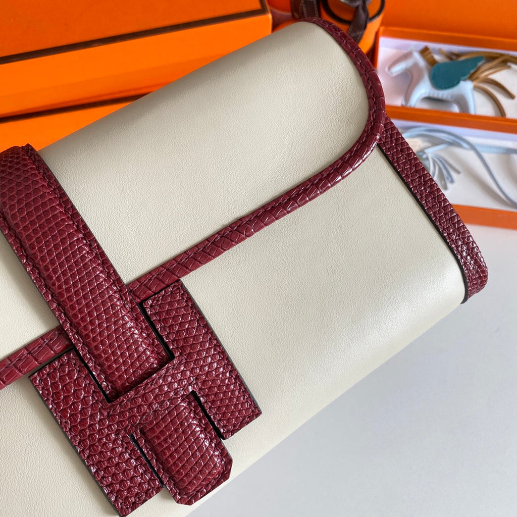 HERMES JIGE ELAN 29 CLUTCH IN WHITE CALFSKIN WITH GARNET RED LIZARD SKIN