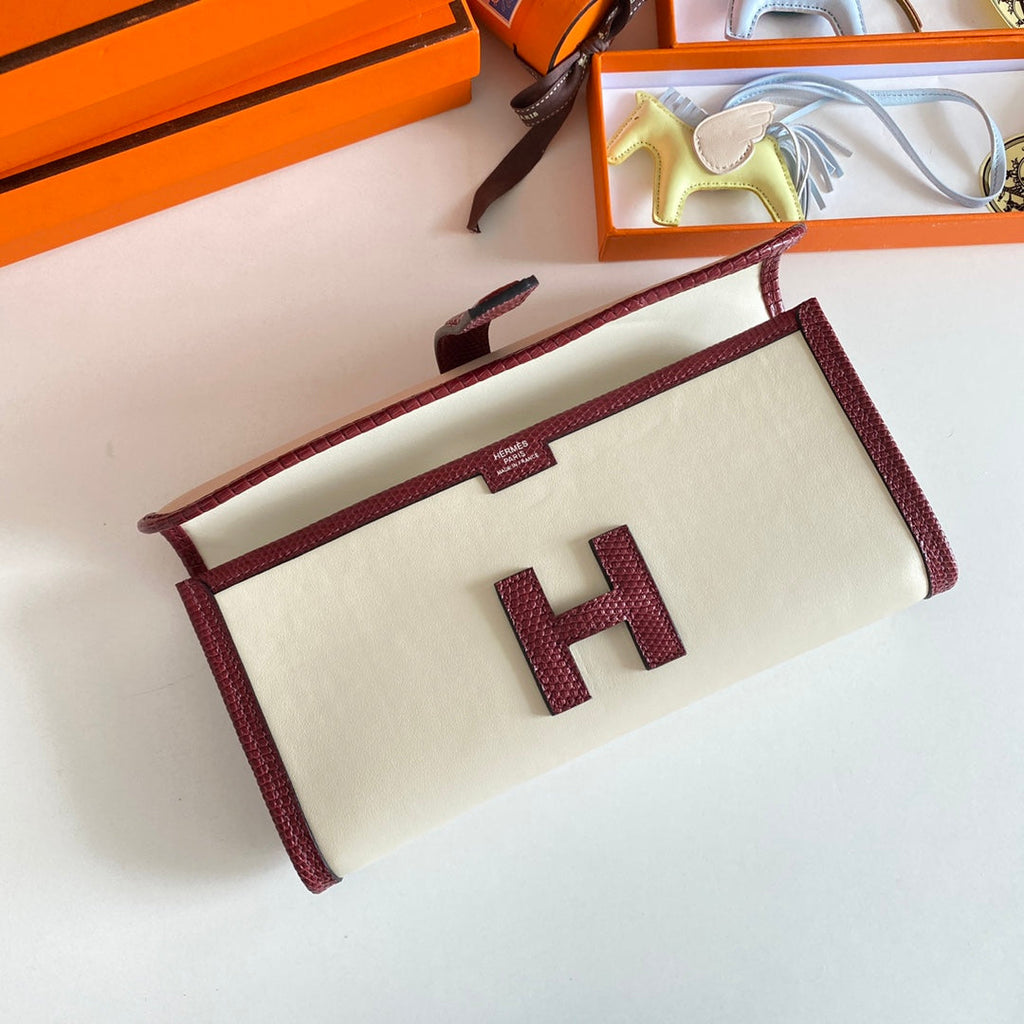 HERMES JIGE ELAN 29 CLUTCH IN WHITE CALFSKIN WITH GARNET RED LIZARD SKIN