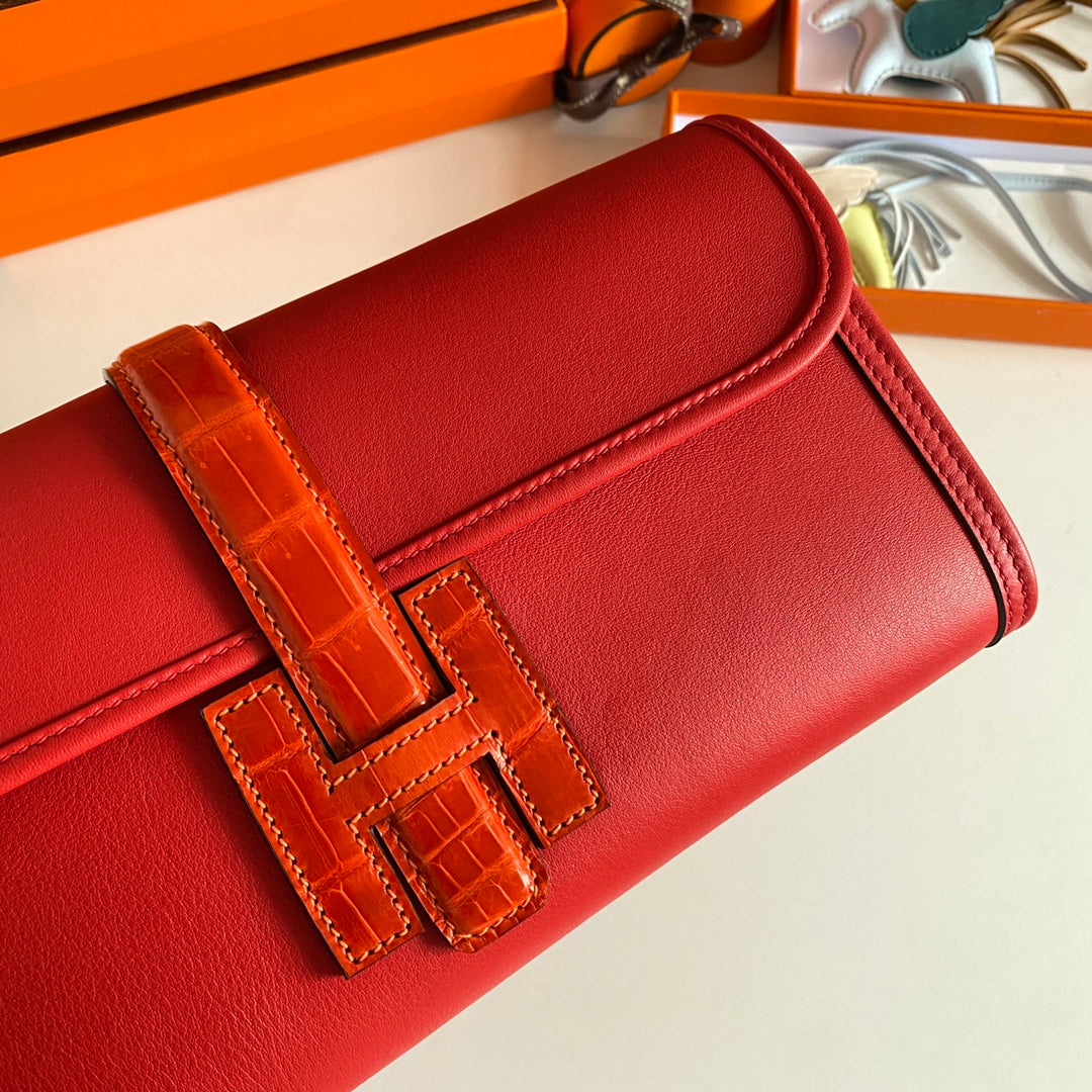 HERMES JIGE ELAN 29 CLUTCH IN RUBY RED CALFSKIN WITH APPLE RED LIZARD SKIN