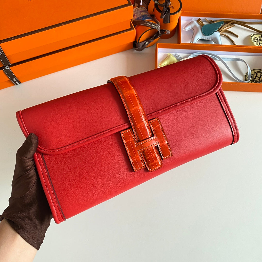 HERMES JIGE ELAN 29 CLUTCH IN RUBY RED CALFSKIN WITH APPLE RED LIZARD SKIN