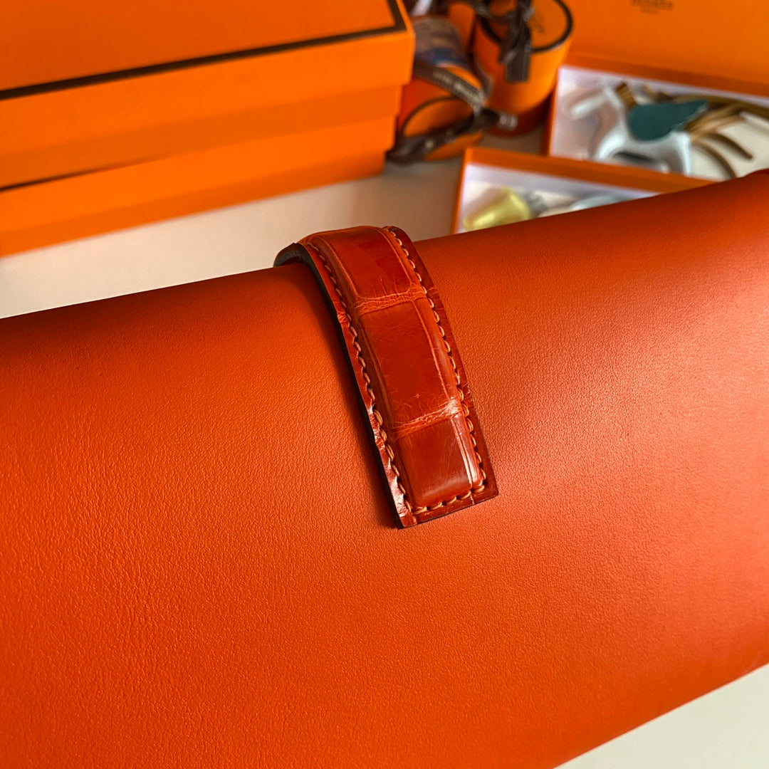 HERMES JIGE ELAN 29 CLUTCH IN BRIGHT ORANGE CALFSKIN WITH LIZARD SKIN