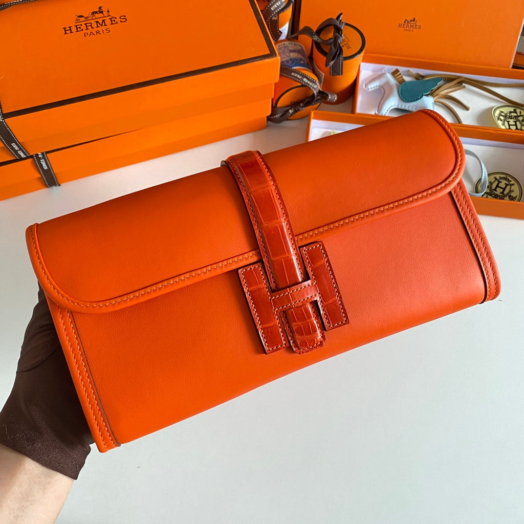 HERMES JIGE ELAN 29 CLUTCH IN BRIGHT ORANGE CALFSKIN WITH LIZARD SKIN