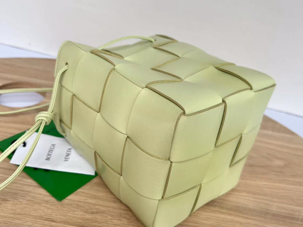 BOTTEGA VENETA SMALL CASSETTE BUCKET 18 IN PASTEL YELLOW CALFSKIN