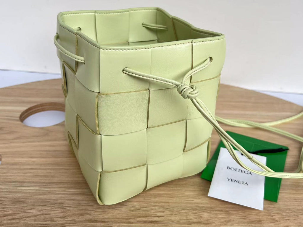 BOTTEGA VENETA SMALL CASSETTE BUCKET 18 IN PASTEL YELLOW CALFSKIN