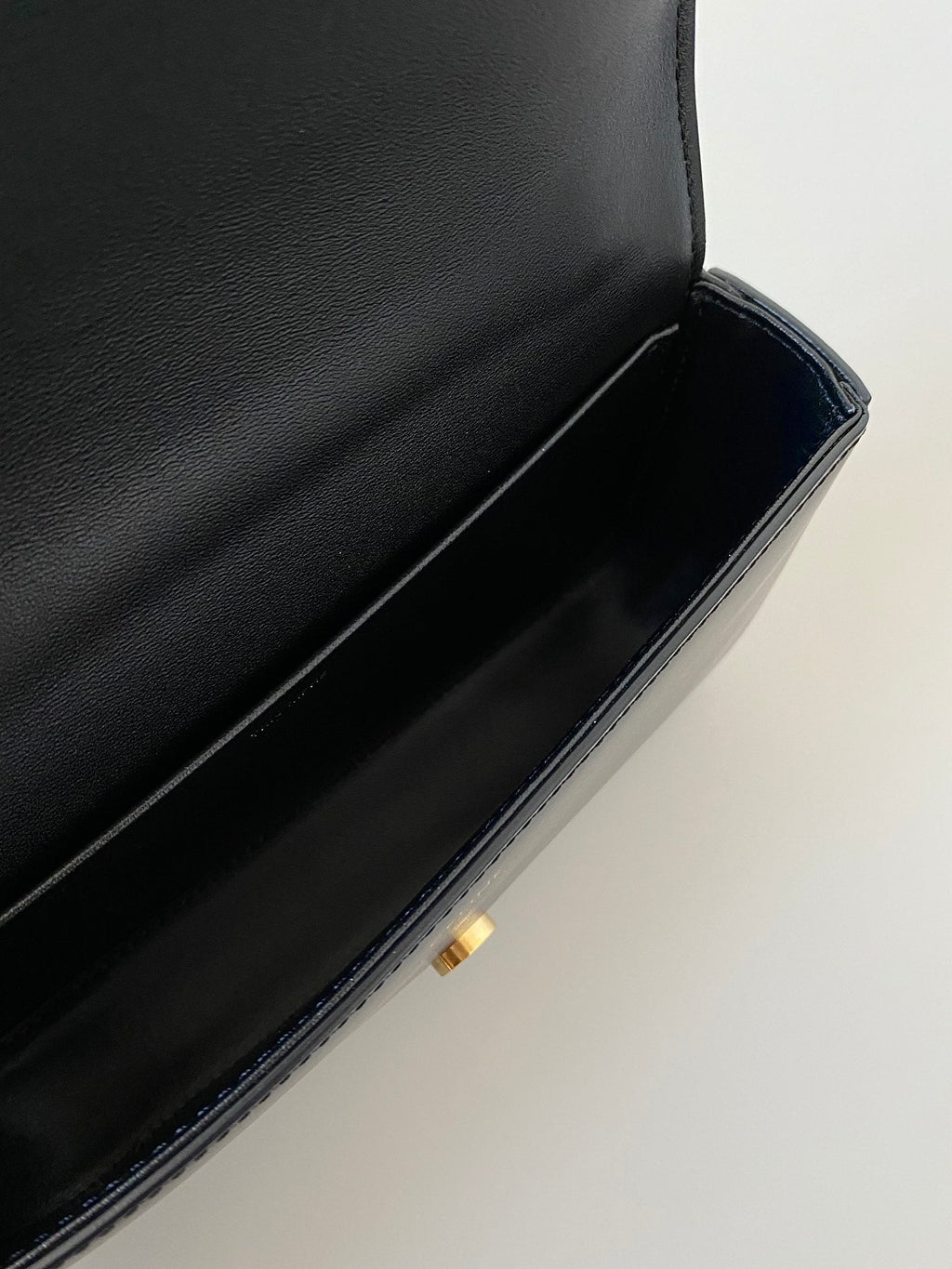 CELINE 20 CHAIN EMBOSSED ARMPIT BAG BLACK CALFSKIN