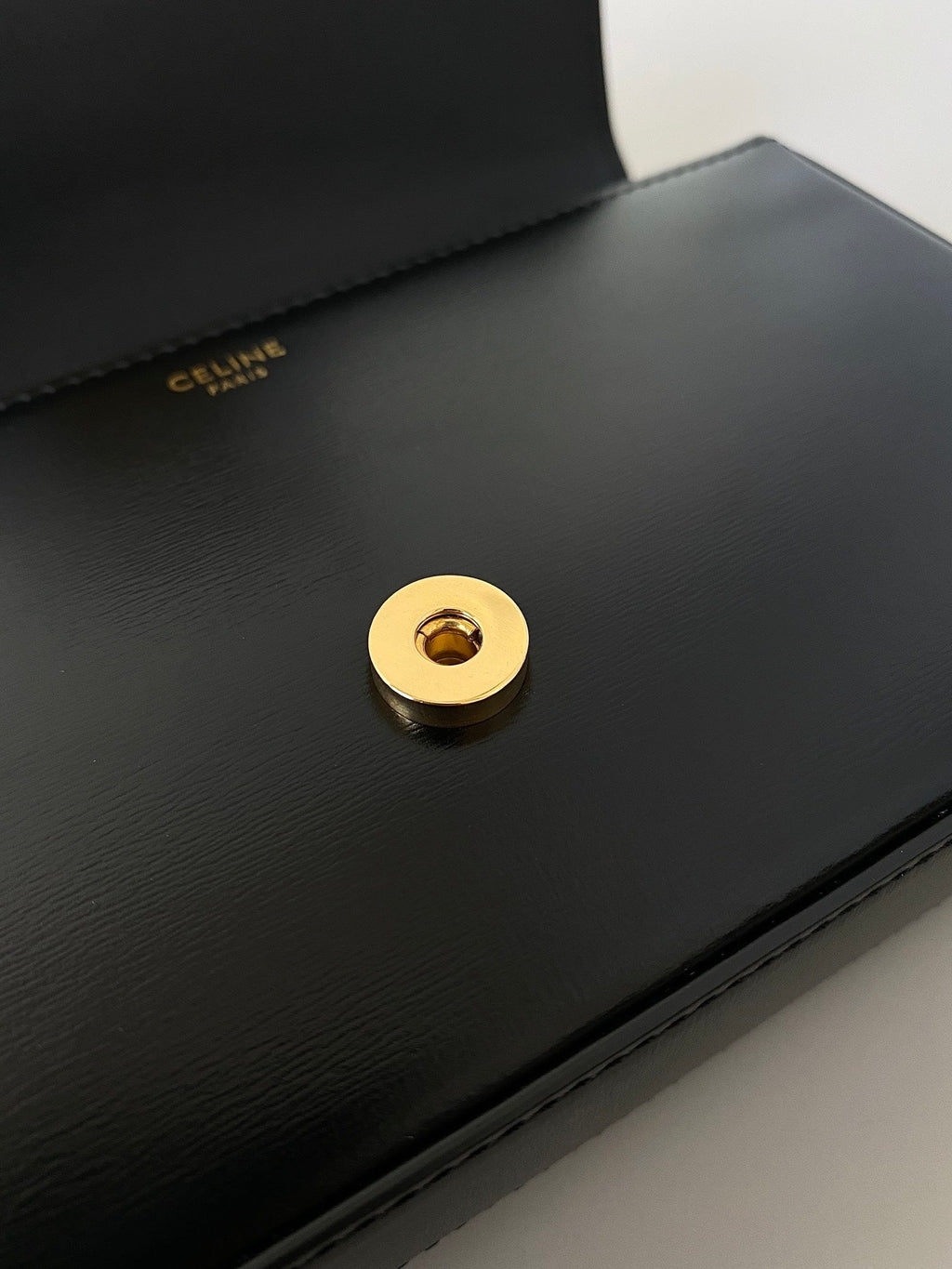 CELINE 20 CHAIN EMBOSSED ARMPIT BAG BLACK CALFSKIN