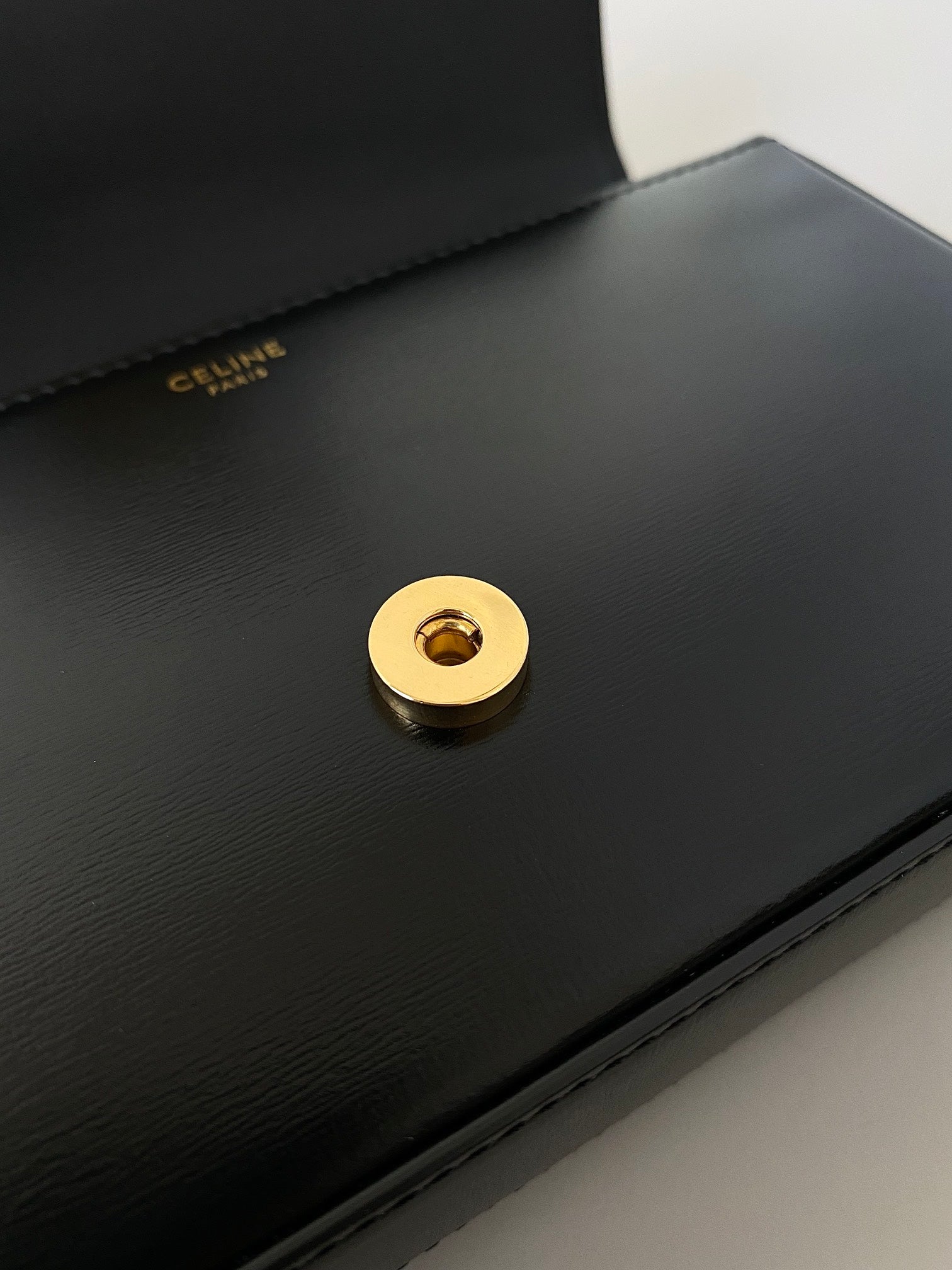CELINE 20 CHAIN EMBOSSED ARMPIT BAG BLACK CALFSKIN