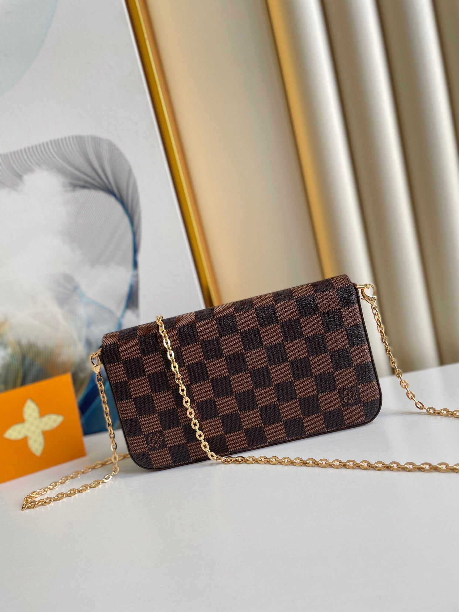 LOUIS VUITTON FÉLICIE POCHETTE 21 IN BROWN DAMIER EBENE COATED CANVAS GOLD HARDWARE