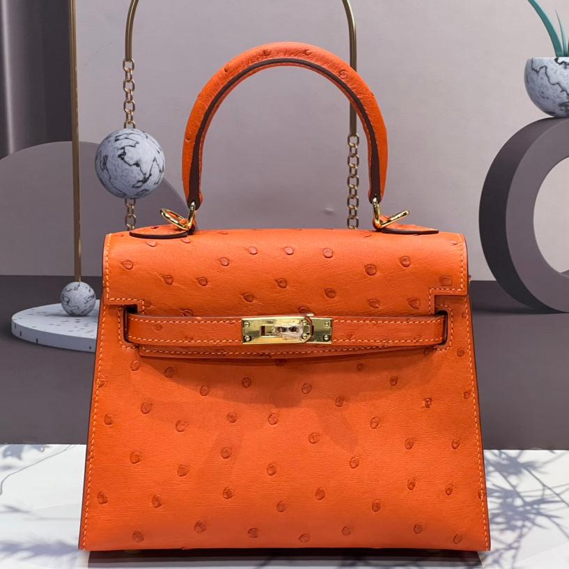 HERMES KELLY BAG 20 IN FIRE ORANGE OSTRICH LEATHER WITH GOLD HARDWARE