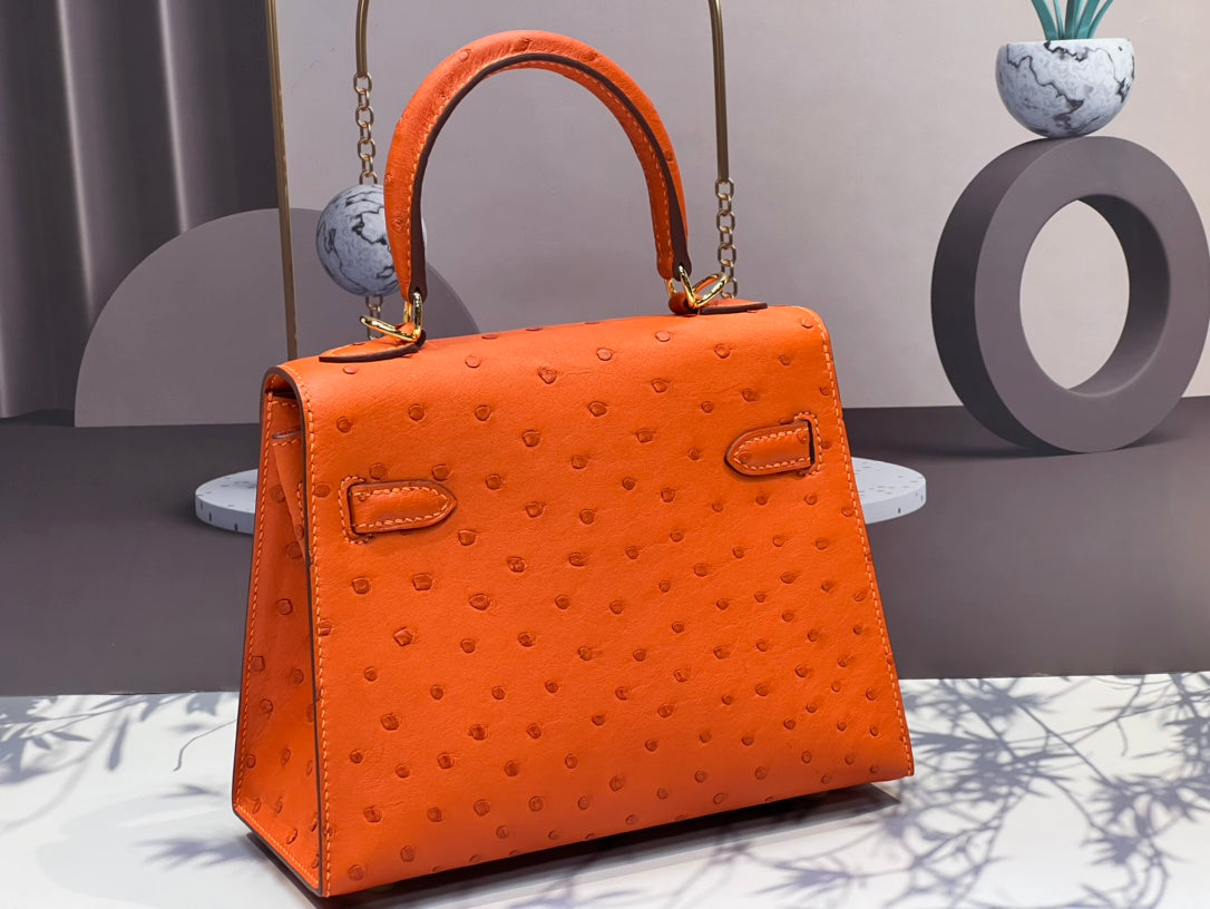 HERMES KELLY BAG 20 IN FIRE ORANGE OSTRICH LEATHER WITH GOLD HARDWARE