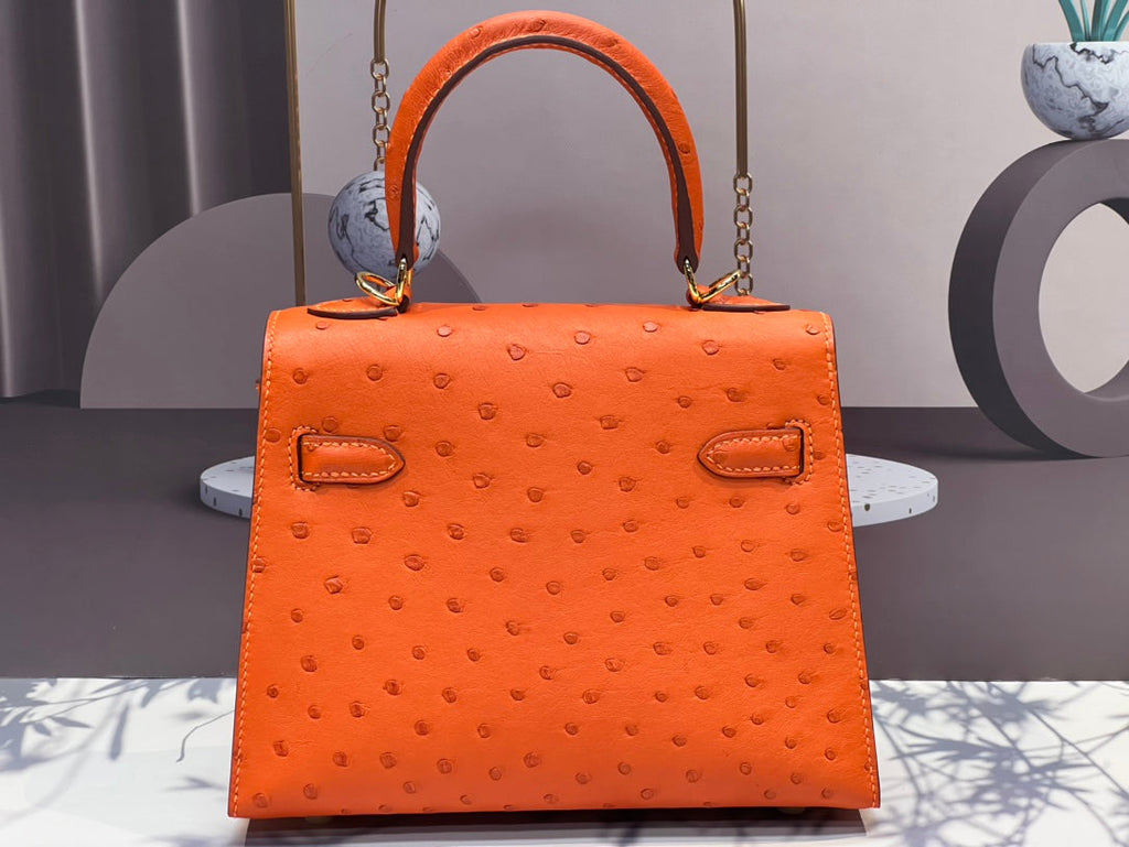 HERMES KELLY BAG 20 IN FIRE ORANGE OSTRICH LEATHER WITH GOLD HARDWARE
