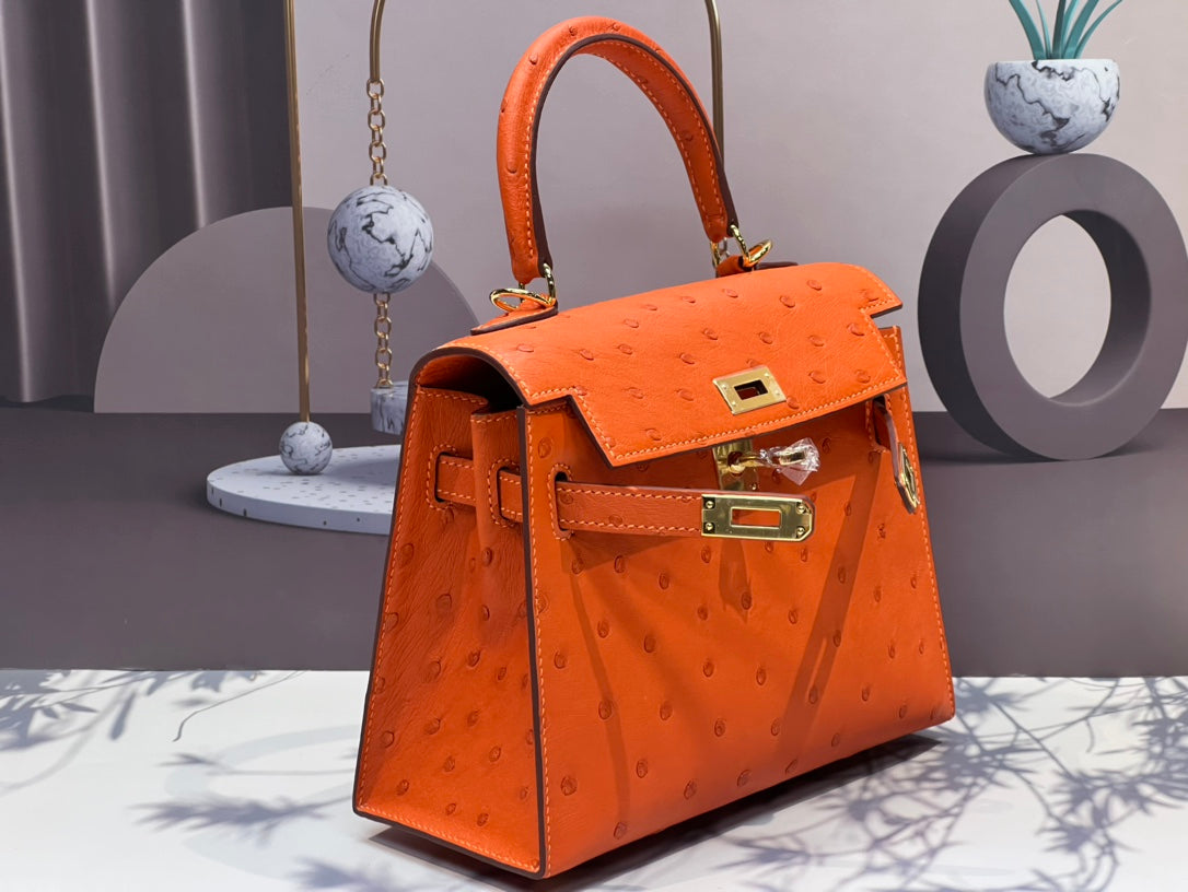 HERMES KELLY BAG 20 IN FIRE ORANGE OSTRICH LEATHER WITH GOLD HARDWARE